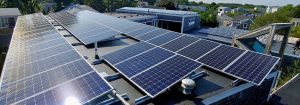 A commercial flat roof with solar panels installed